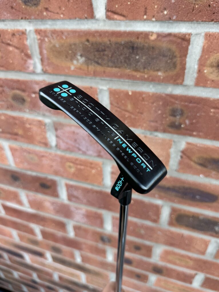 Refurbished Scotty Cameron Newport with teal Cerakote finish by Putter Refurb UK